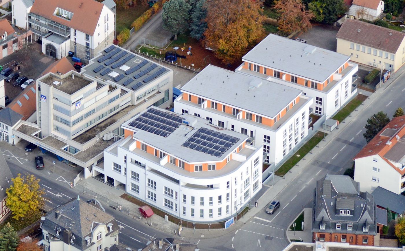 Volksbank-Quartier Butzbach, 38 Wohnungen, 1.000 m² Gewerbe, Tiefgarage